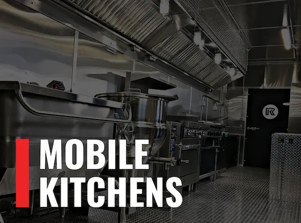 Image of the interior of a mobile kitchen with the words "Mobile Kitchens"
