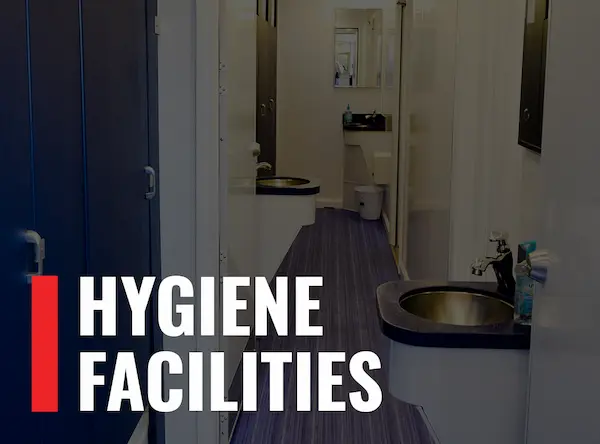 Image of the interior of a mobile bathroom unit with the words "Hygiene Facilities"